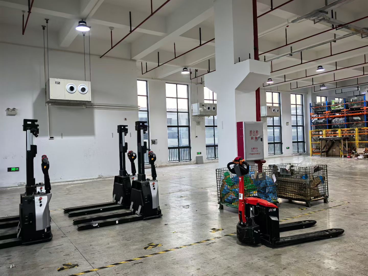 Multiple energy saving air conditioner units installed on a factory wall